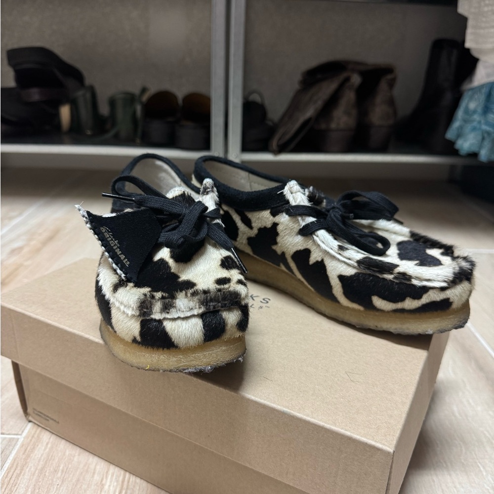 Clarks Black and White Cow Print Wallabees